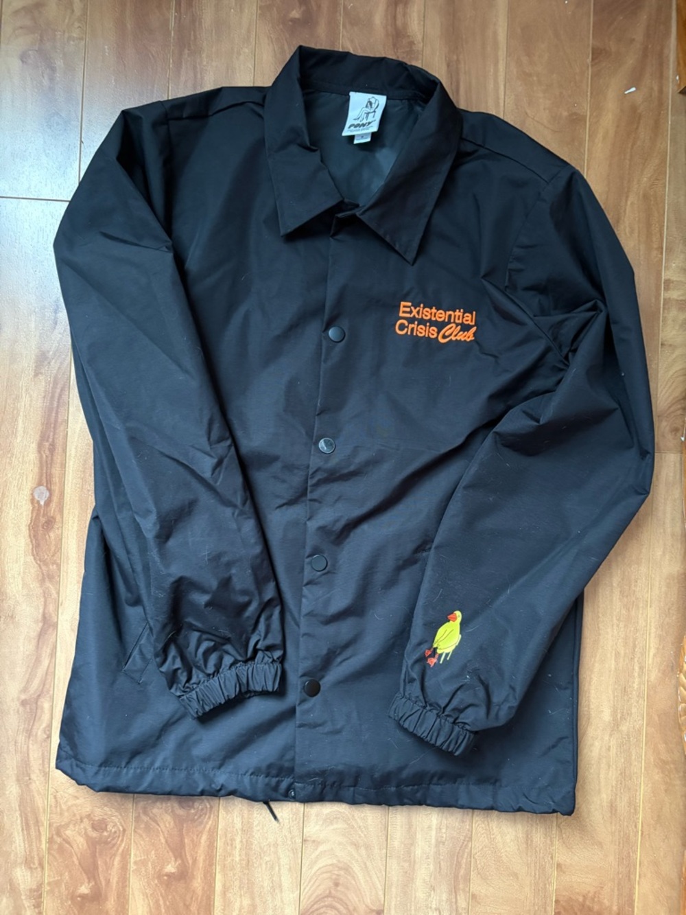 Pony Black Jacket with White Logo Tag